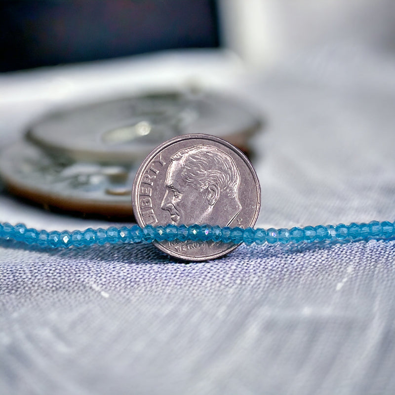 2mm Thunder Polish Glass Crystal Roundel Med. Aquamarine AB