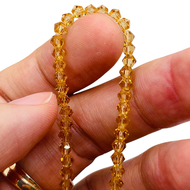 4mm Thunder Polish Glass Crystal Bicone Gold Champagne
