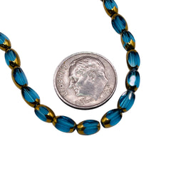 6x3mm Oval Glass Crystal Gold Edge Med. Aquamarine