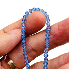 4mm Thunder Polish Glass Crystal Bicone Lt. Sapphire