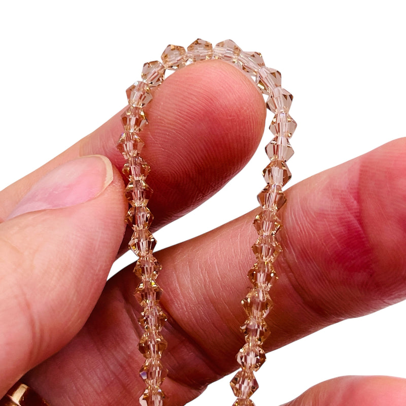 4mm Thunder Polish Glass Crystal Bicone Silver Champaign